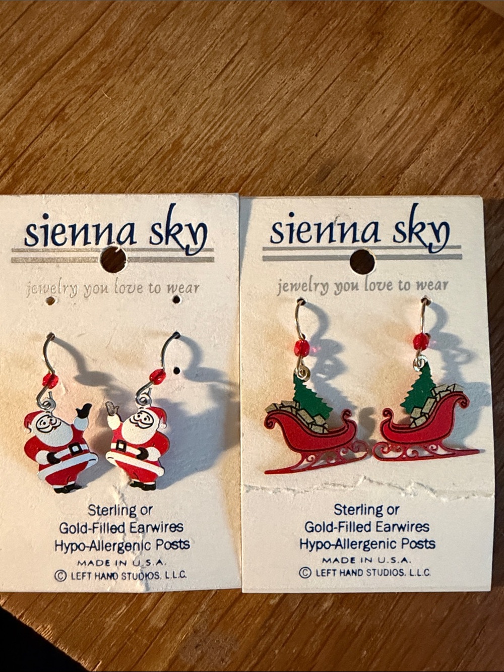 Sienna sky earrings.  Santa and sled